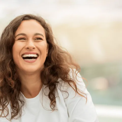 adult woman with brown hair smiling