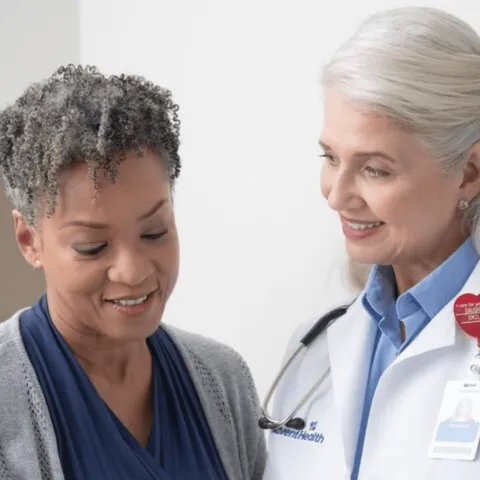 doctor discussing screenings with patient