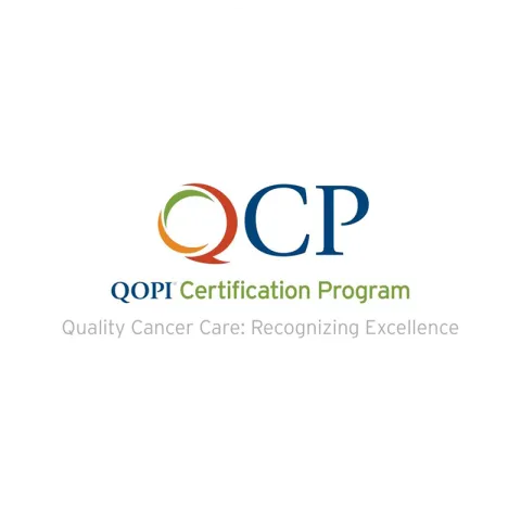 The logo for QOPI