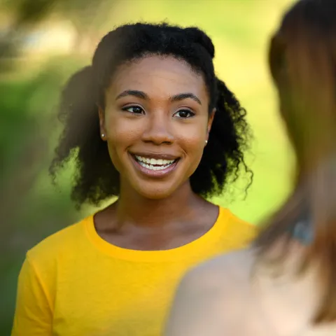 Women enjoying a nice conversation in the park.