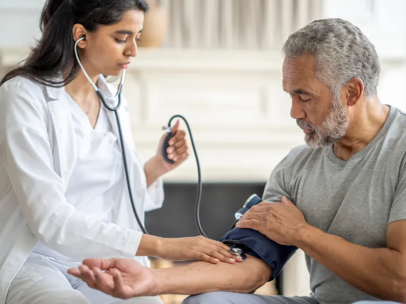 A Provider Checks a Patient's Blood Pressure