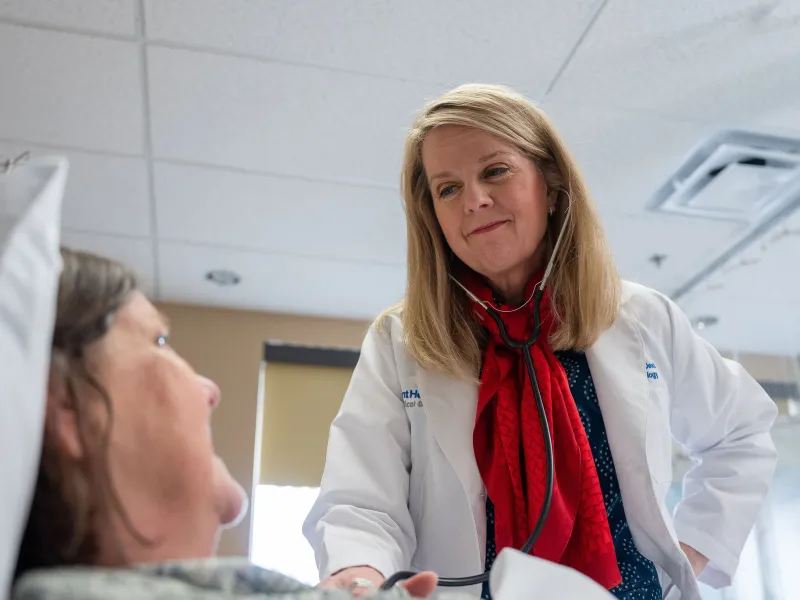 dr-dew-cardiology-womens-ahsm-with-patient