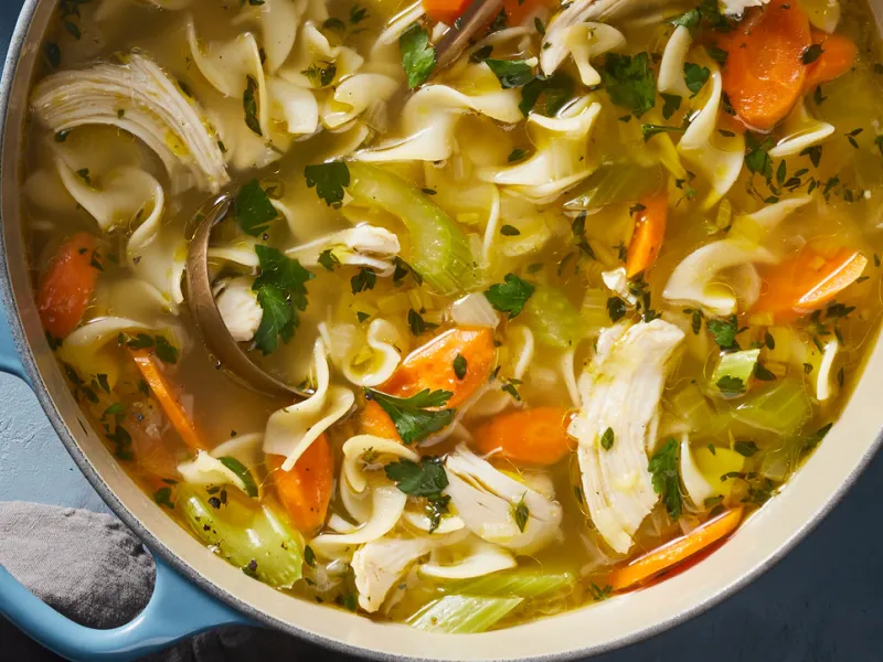 Pot full of chicken noodle soup