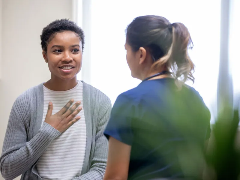 A female patient talking to her female doctor