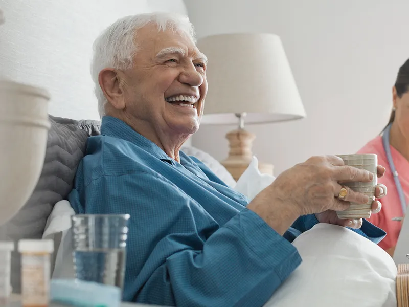 Elderly patient laughing
