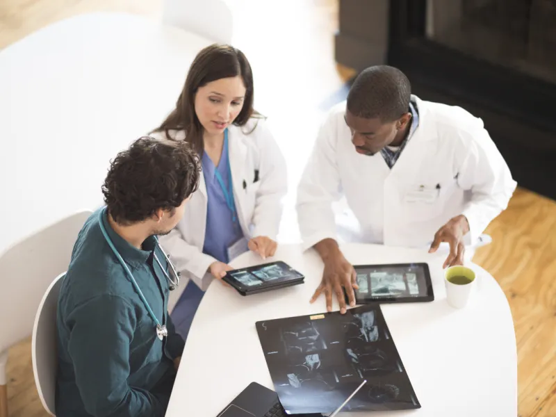 physicians talking to each other