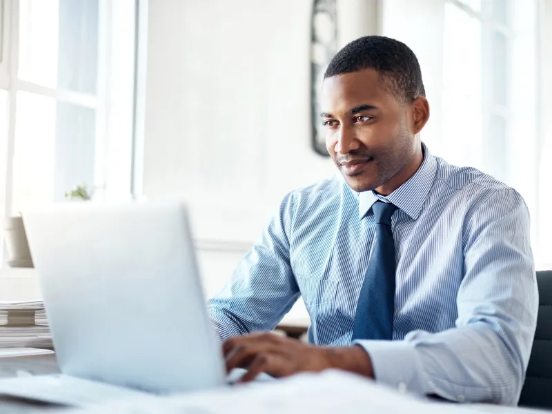 Young professional man working on a laptop