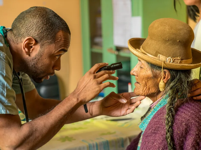 Physician checking patient's health.