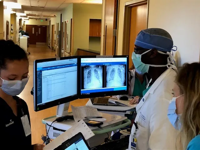 GME Critical Care doctor reading scans