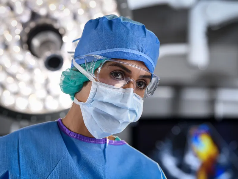 Female surgeon wearing mask