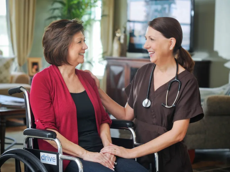 home health nurse with patient