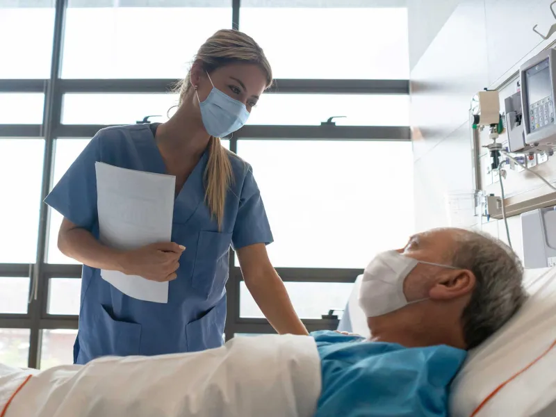 kind-nurse-checking-on-her-patient-2000x1333px