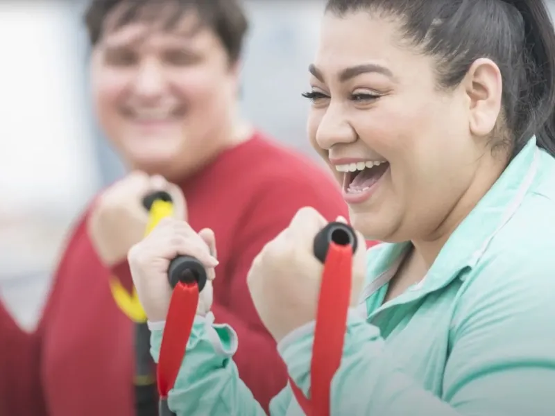 two overweight women working out