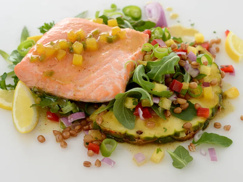 Salmon and pineapple slice with salad.