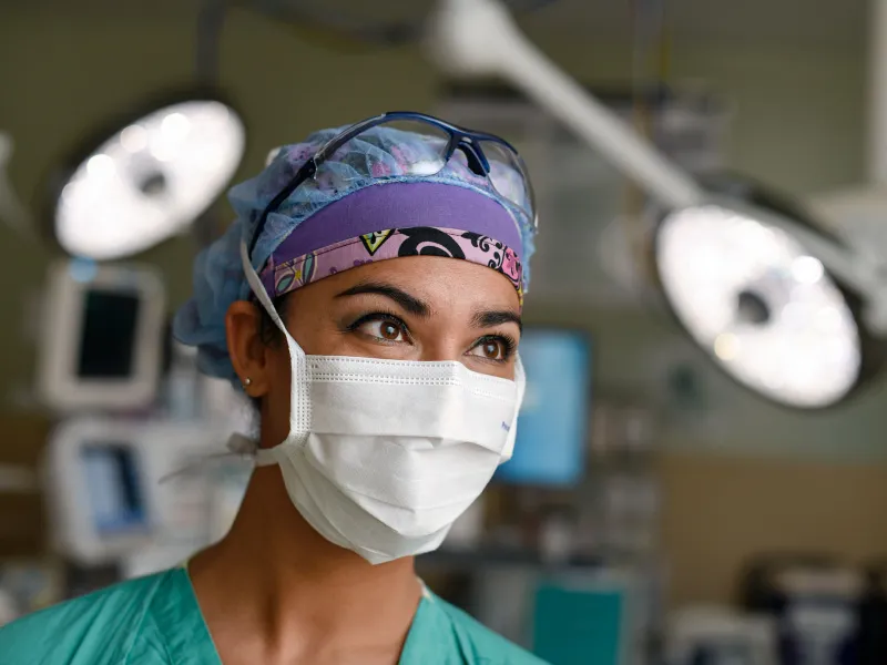A nurse focusing her attention in the operating room