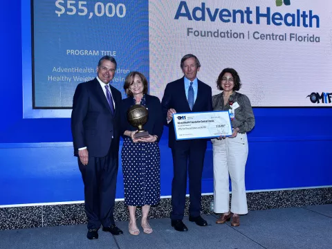 The Orlando Magic Youth Foundation check presentation