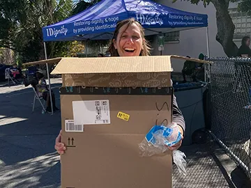 Staff member helping at iDignity