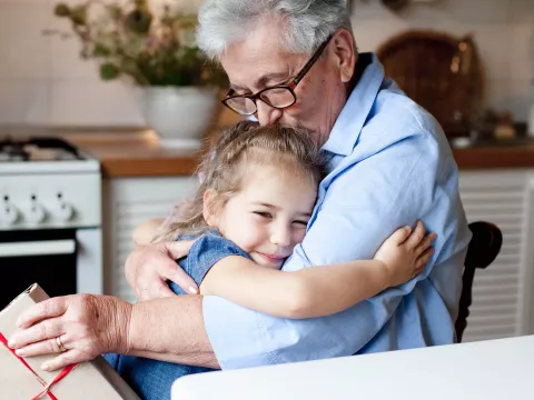 Grandfather soothes young child