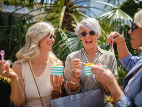 A group of women eating dessert.