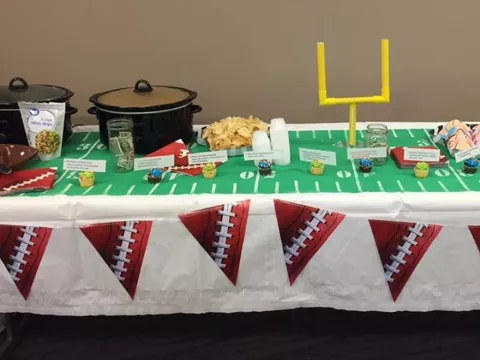 A table decorated with football theme.