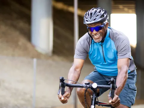 LP-Hero-Desktop-west-cv-vascular-senior-black-man-riding-bike