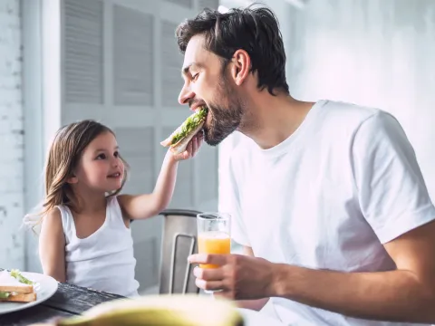 Father and Daughter Eating Healthy
