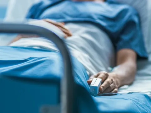patient laying down on a hospital bed