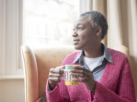 Mature Woman at Window