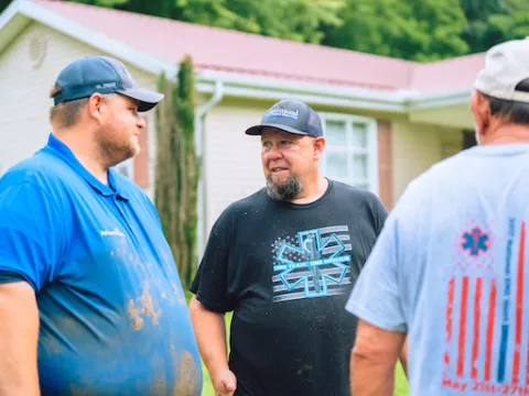 Frankie Matthews works on relief logistics with team members