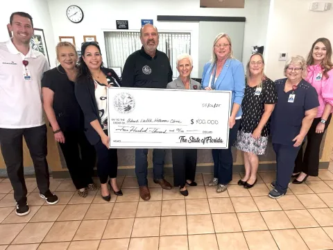 Community Clinic check presentation 