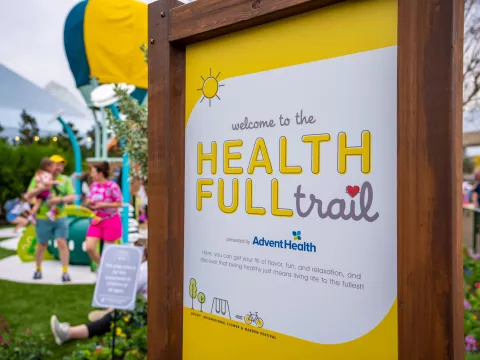 AdventHealth Healthfull Trail sign at AdventHealth Healthfull Trail at the 2022 Epcot Flower and Garden Festival.
