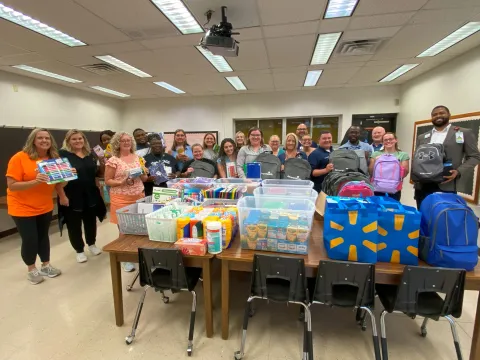 Staff at the hospital donated and delivered to the school 2,528 pencils, about 200 notebooks, 177 boxes of crayons, 287 glue sticks and more than 30 backpacks, among other items.