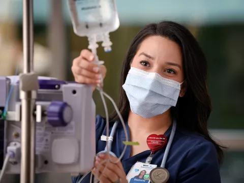 AdventHealth nurse modifying the IV pouch