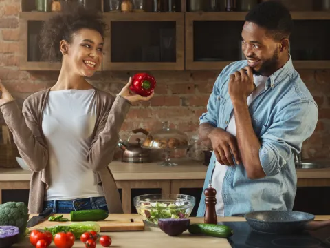 Couple cooking a healthy meal together