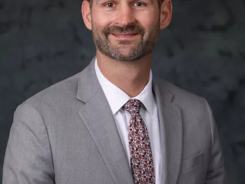 Headshot of Cory Reeves.