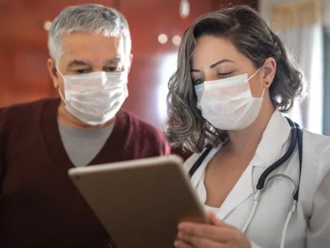 Two doctors in masks. 