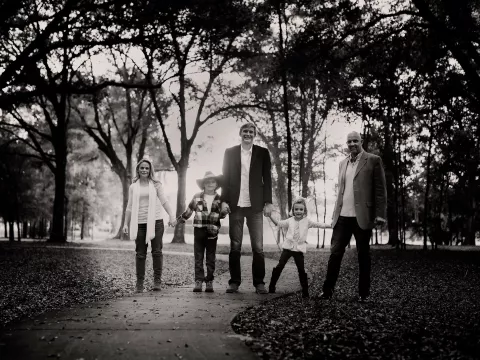 The Stumpf family standing outside