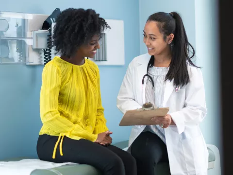 A young woman visiting the doctor.