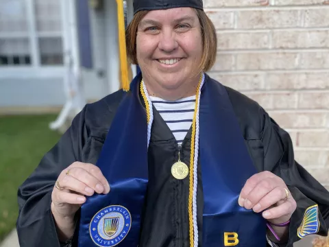 Ann Pettey in graduation robes