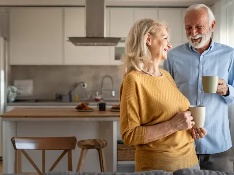 60s couple in their living room