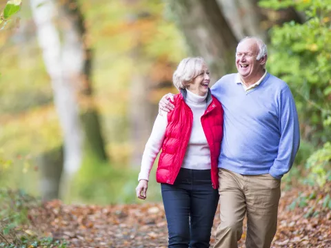 couple holding each other in the outdoors