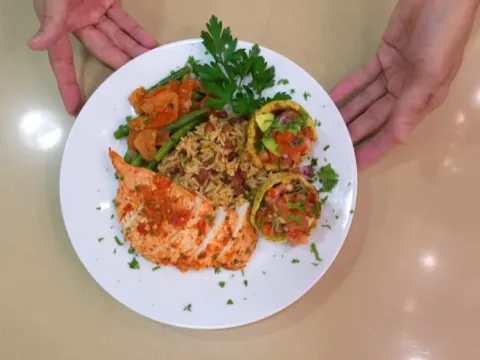 A vibrant Latin feast — spring chicken, mamposteao rice, mofongo cups, and Spanish green beans, all bursting with flavor and heritage.