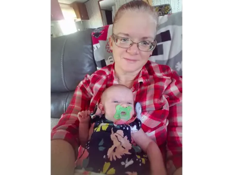 Jennifer holding her newborn baby