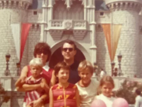 Doctor Metzger and his family at Disney's Magic Kingdom in 1976