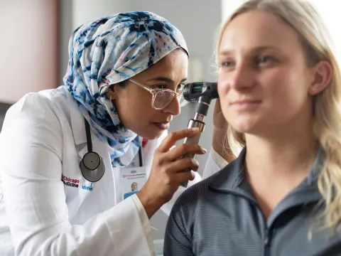 Provider examining patient