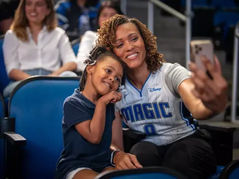 Orlando Magic Fan with Daughter at Game