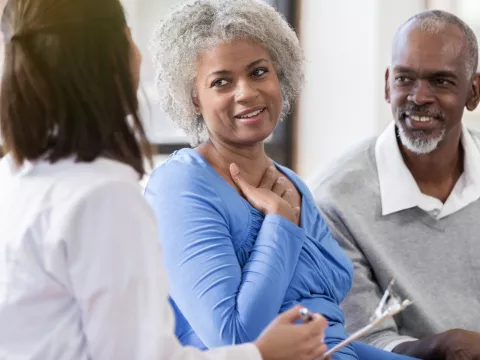 Couple learning they've been matched with a donor