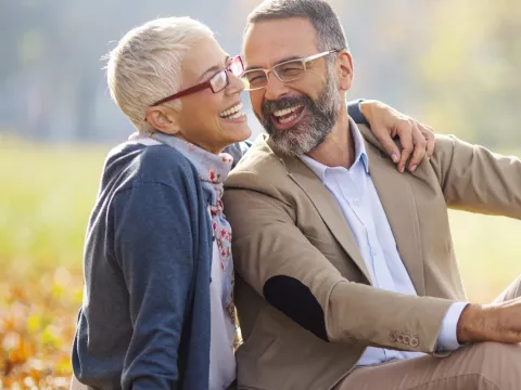 Happy, healthy couple in the park.