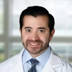 D. Aaron Guel, MD