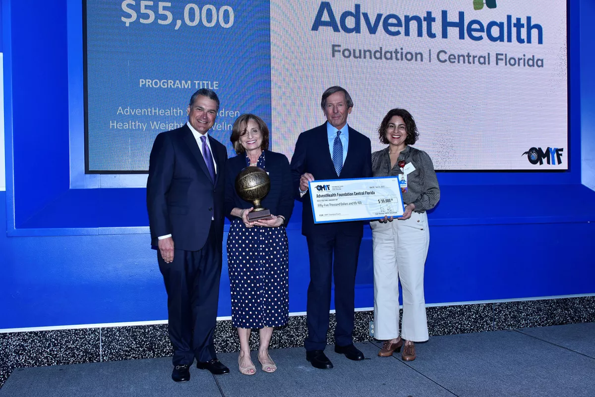 The Orlando Magic Youth Foundation check presentation